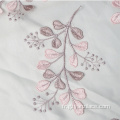 Tissu en dentelle avec broderie layser rose clair